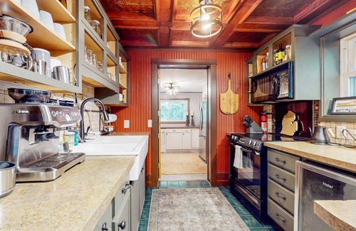 Fennville House | Lake Michigan Retreat with large patio, gas grill, fire pit, & outdoor hot tub