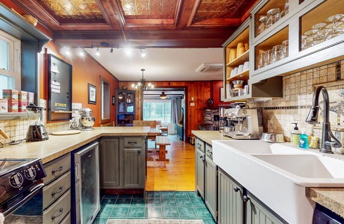 Fennville House | Lake Michigan Retreat with large patio, gas grill, fire pit, & outdoor hot tub