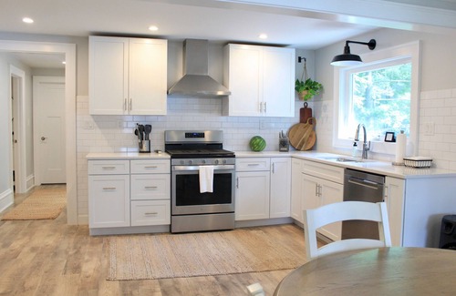 Effingham House | Lake Sara cottage: 3BR/2BA, hot tub, swim dock, firepit, kayaks, & lake views!