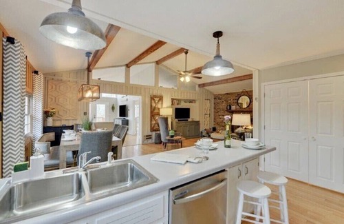 Reed Creek House | Lake toys with calm deep water dock near the widest part of the lake