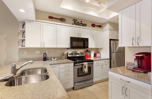 Highland Lake Estates Condo | Lake Travis Stunning Sunset Waterfront Views, Pool, w/Boat Ramp. Pet Friendly