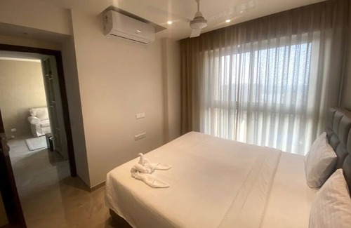 Hiranandani Gardens Apartment | Lake View 1-bedroom @ Hiranandani Powai- Maxxvalue