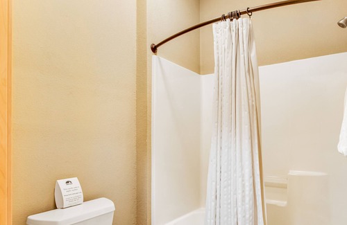 Three Lakes Condo | Lake-view, 3rd-floor studio with kitchenette, balcony, pool, hot tubs, & gym