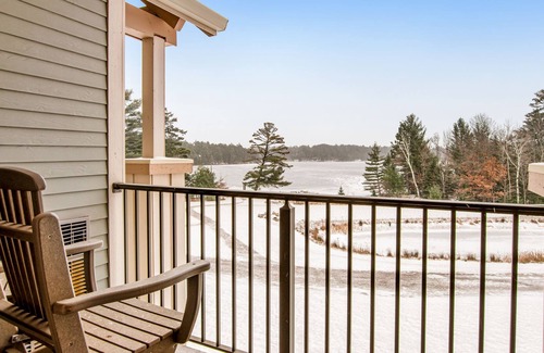 Three Lakes Condo | Lake-view, 3rd-floor studio with kitchenette, balcony, pool, hot tubs, & gym