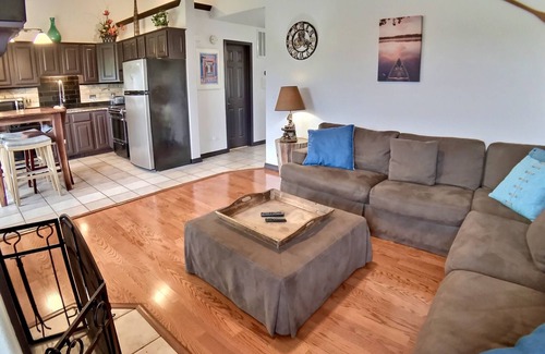 Holiday Island Condo | Lake view condo with fireplace, firepit, deck & central AC