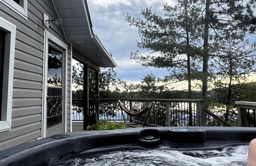 Catchacoma Cottage | Lake view cottage, clean weed free swimming and a hot tub on Mississagua Lake
