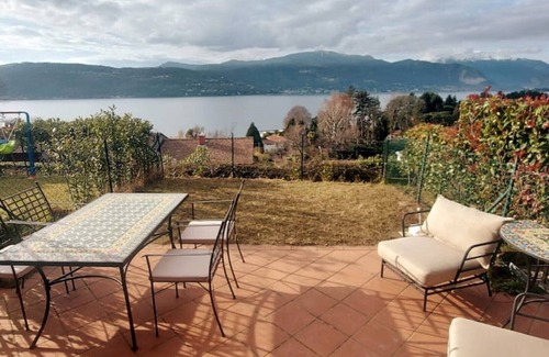 Cerro House | Lake view, pool, near the beach, pinball machine, darts, arcade