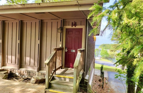Mount Ida Apartment | Lake view queen guest room with two queens, sleeper sofa and patio overlooking Lake Ouachita. by RedAwning