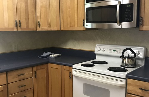 Mount Ida Cottage | Lake view two bedroom, two bath Harbor North luxuryloft cottage with private hot tub overlooking Lake Ouachita. by RedAwning