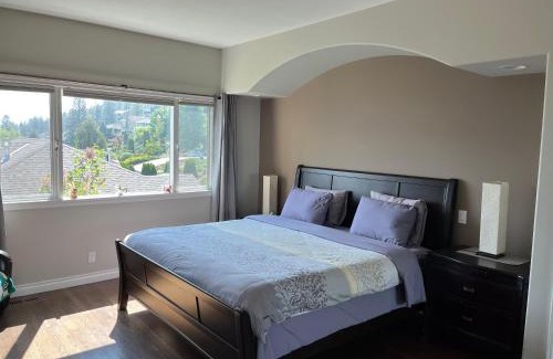 Central Okanagan Bed & Breakfast | Lake view yellow house by winery resort