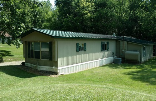 Coldwater House | Lakeaccess Tikihut Home process of remodeling and refurnishing new photos coming