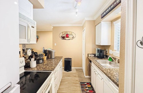 Walden on Lake Conroe Condo | Lakefront Action | Paddle Pickle Pool Sunsets