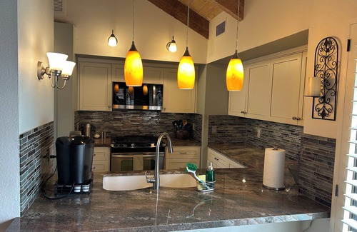 Rancho Mirage Condo | Lakefront Beauty - listen to the birds chirp while drinking your morning coffee