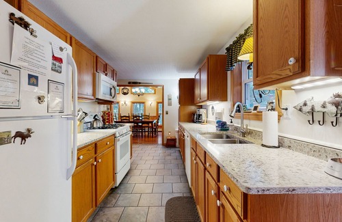 Beaver Cove House | Lakefront cabin close to town with dock, firepit - dogs welcome