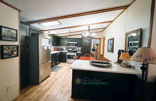 Traverse City House | Lakefront cabin on Bass Lake near Traverse City. Pets ok. Fire pit. Grill.