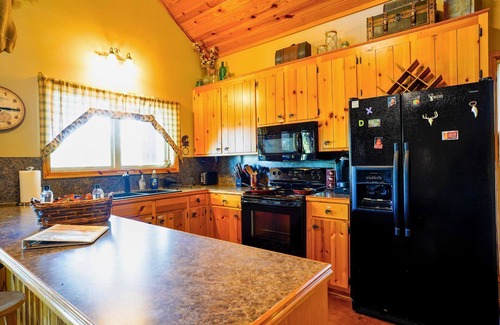 Shelbyville Cabin | Lakefront Cabin w/Pier, Firepit & Pet-Friendly