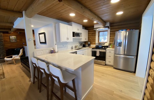 Plymouth House | Lakefront cabin with dock, hot tub, fire pit!