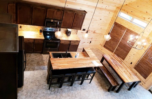 Pine Level Cabin | Lakefront cabin with perfect sunsets, great fishing, and tons of space to relax!