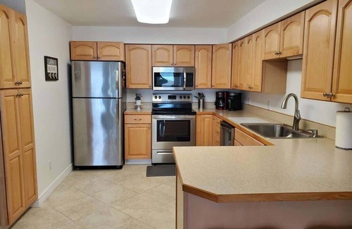 Polson Condo | Lakefront Condo-huge patio, day dock, beach front!