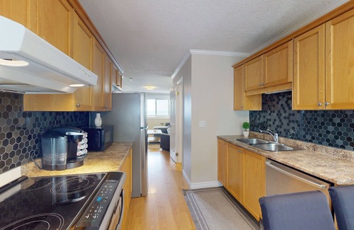 Wasaga Beach House | Lakefront condo steps to the beach with pool, and fireplace