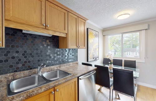 Wasaga Beach House | Lakefront condo steps to the beach with pool, and fireplace