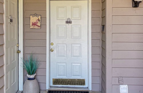 Sea Trail Condo | Lakefront condo with patio, AC, & water views plus pool & tennis
