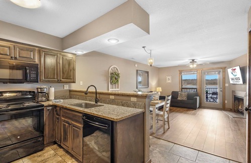 Indian Point Condo | Lakefront Condo with direct water view! Ticket DEALS and Resort Perks included. Sleeps 6