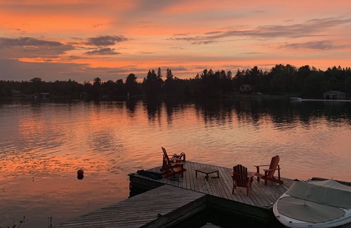 Ahmic Harbour Cottage | Lakefront cottage getaway. Dock by day, fire by night!