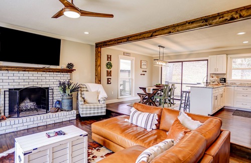 Young Harris Cottage | Lakefront cottage with private dock, hot tub, fireplace & game room