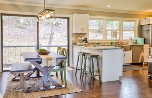 Young Harris Cottage | Lakefront cottage with private dock, hot tub, fireplace & game room