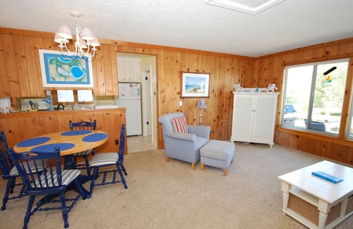 Glen Arbor House | Lakefront cottage with a deck, grill, firepit, dock & partial AC