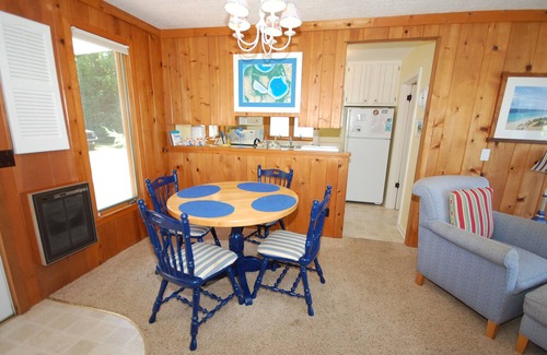 Glen Arbor House | Lakefront cottage with a deck, grill, firepit, dock & partial AC