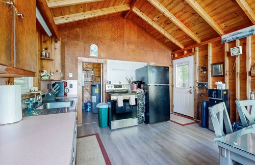Bremen Cabin | Lakefront cottage with dock, screened porch, & Island in Biscay Pond