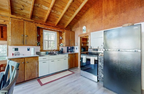 Bremen Cabin | Lakefront cottage with dock, screened porch, & Island in Biscay Pond