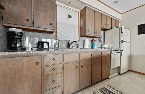 Cadillac House | Lakefront Cottage with Sunset Views
