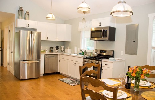 Red Hook Cottage | Lakefront cottage with Year round Hot Tub private beach and dock
