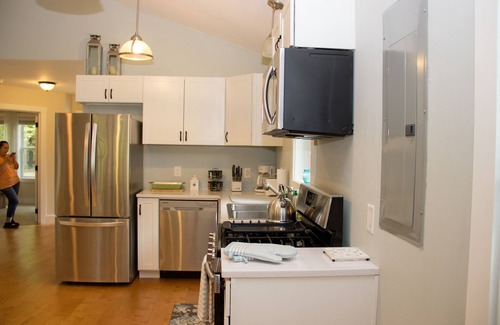 Red Hook Cottage | Lakefront cottage with Year round Hot Tub private beach and dock
