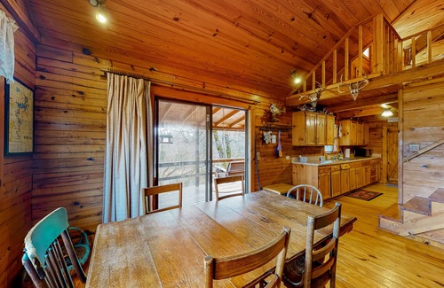 Eureka Springs Cabin | Lakefront dog-friendly log cabin with private boat access, firepit, & grill