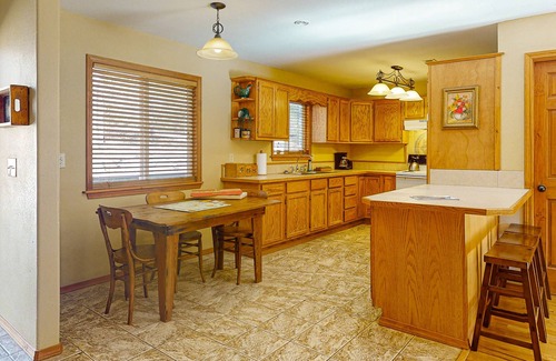 Eureka Springs Cottage | Lakefront dog-friendly home near Eureka Springs with deck, lake views, fireplace