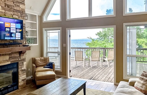 Pointblank House | Lakefront dog-friendly home with alfresco dining, balcony, & fireplace