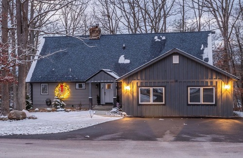 Oakland House | Lakefront, dog friendly, dock slip, hot tub, and fire pit