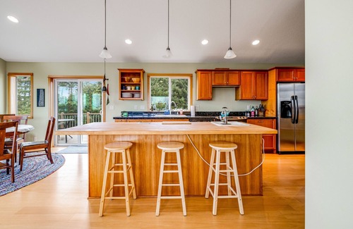 Cape Meares House | Lakefront escape with water views, grill, wrap-around deck - walk to beach