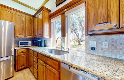 Bridgeport House | Lakefront estate with spectacular views, large deck, tiki bar, & private dock