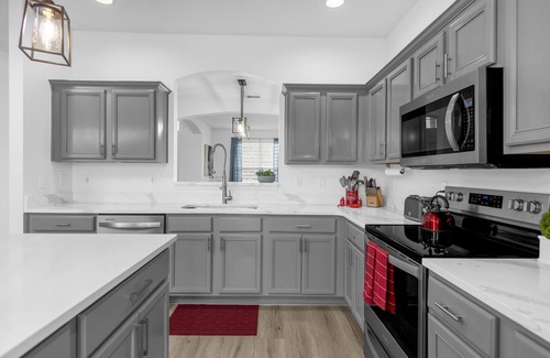 Kissimmee Villa | Lakefront Family Getaway with Pool and Game Room. Minutes to Disney!