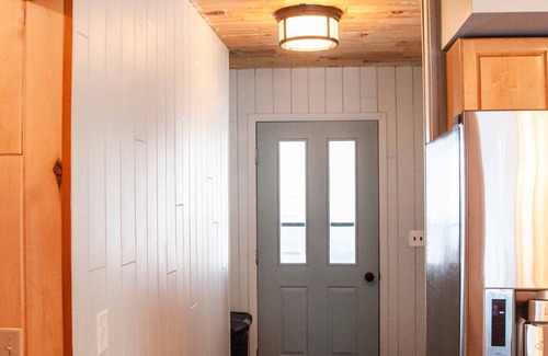 Munising House | Lakefront family getaway;large dock;private boat ramp;Pretty cottage;large deck!