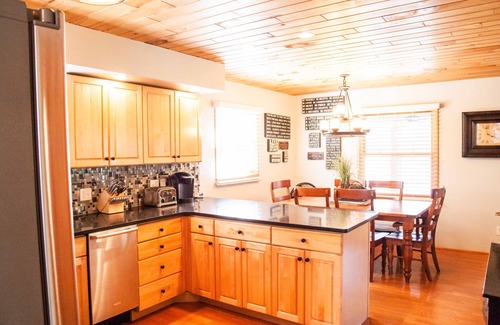 Munising House | Lakefront family getaway;large dock;private boat ramp;Pretty cottage;large deck!