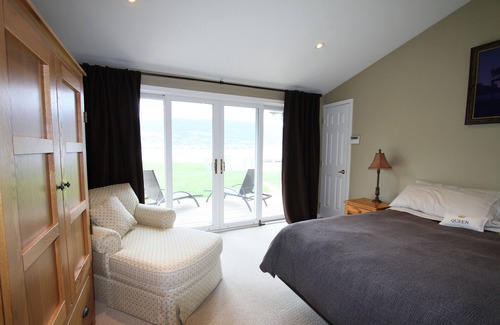 Okanagan-Similkameen House | Lakefront family oriented property -- flat, fully fenced 177 ft. beach front