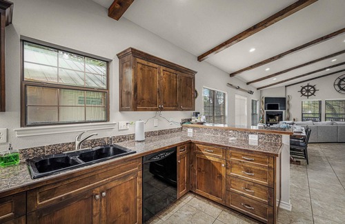 McQueeney House | Lakefront | Fire pit | Outdoor kitchen