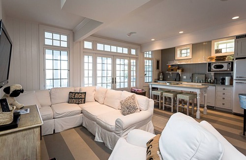 Grand Beach House | Lakefront Gem with amazing patio views, bunk room, private heated pool, gameroom