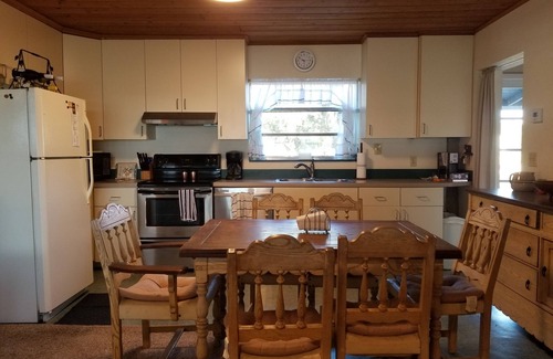 Lake Placid House | Lakefront getaway with white sand, clear water, gorgeous sunsets